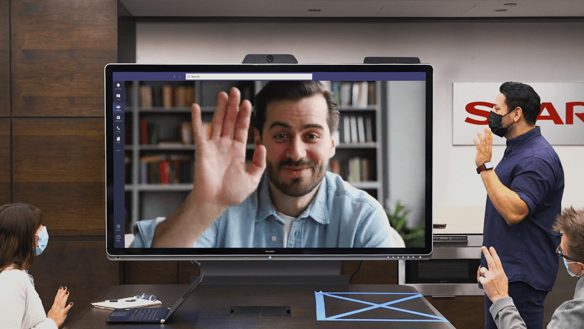Windows Collaboration Display being used in meeting with 1 video chat participant on screen